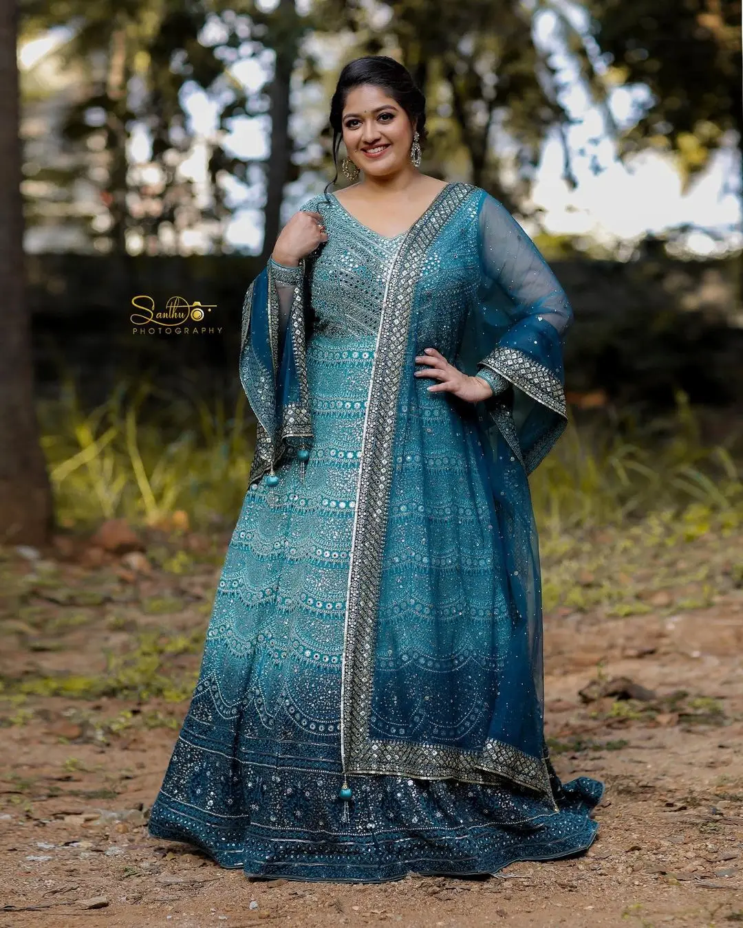 Actress Meghana Raj Stills in Beautiful Blue Designer Gown